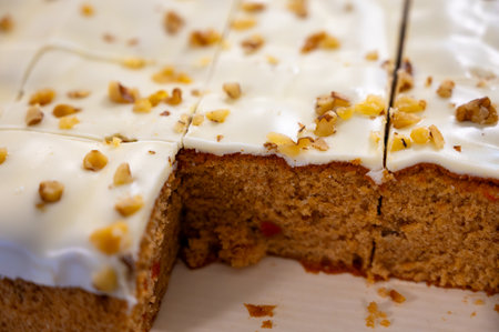 Vegan carrots gluten-free cake with walnuts in piecesの写真素材