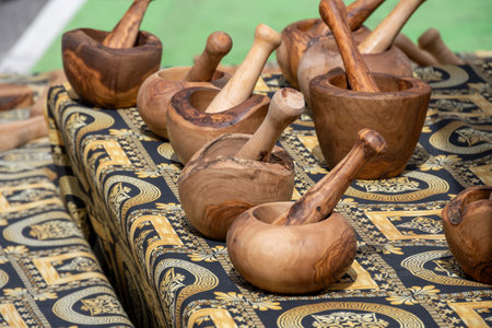 Craft works on table, olive tree wooden kitchen utensils on weekly farmers market in Sisteron, Provence, Franceの写真素材