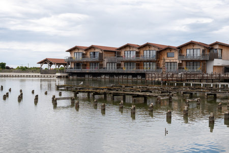 Traveling in France, old wooden huts and oysters farms in Gujan-Mestras village, cultivation, fishing and sale of fresh oysters seashells, Arcachon bay, Atlantic ocean, France, tourists destinationの写真素材