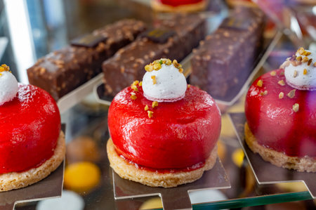 French cuisine, fresh baked strawberry ball cake with chantilly cream, sweet dessert close up