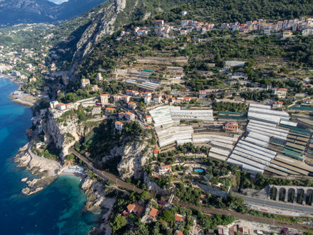 Aerial view on Italian Riviera and blue Mediterranean Sea from French-Italian border in Grimaldi village, Ventimiglia near San-Remo, travel destination, panoramic view from aboveの写真素材
