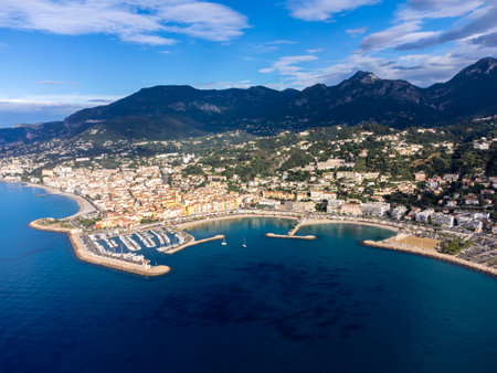 Aerial view on French Riviera, colorful Menton old city and marina on blue Mediterranean Sea near French-Italian border, travel destination, panoramic view from aboveの写真素材