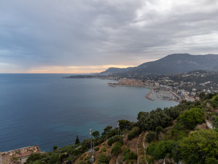 Aerial view on French Riviera, Menton, Monte-Carlo and Monaco and Mediterranean Sea as seen from French-Italian border at sunset, travel destination, panoramic view from aboveの写真素材