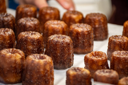 Baked Canele, French pastry flavored with rum and vanilla, specialty of Bordeaux region, Franceの写真素材