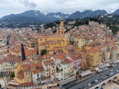 Aerial view on French Riviera, colorful Menton old city and marina on blue Mediterranean Sea near French-Italian border, travel destination, panoramic view from aboveの写真素材