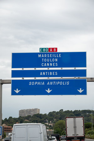 Driving car on A8 road, road signs with directions to Marseille, Digne, Cannes on French Riviera, south of Franceの写真素材