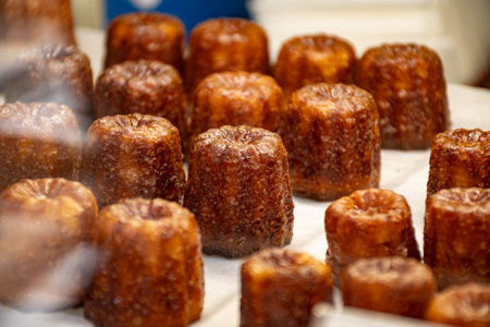 Baked Canele, French pastry flavored with rum and vanilla, specialty of Bordeaux region, Franceの写真素材