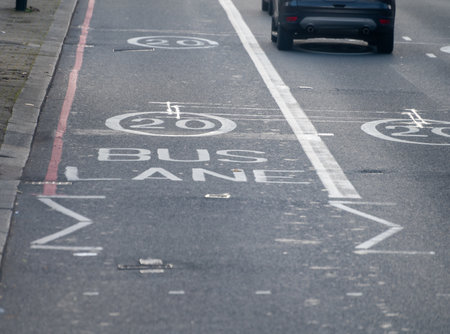 Transportation in London city, roads, road signes, street signs, different warnings, indicating of directions in Great Britain, city life in Englandの写真素材