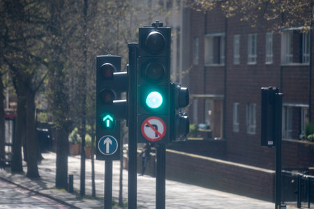 Transportation in London city, roads, road signes, street signs, different warnings, indicating of directions in Great Britain, city life in Englandの写真素材
