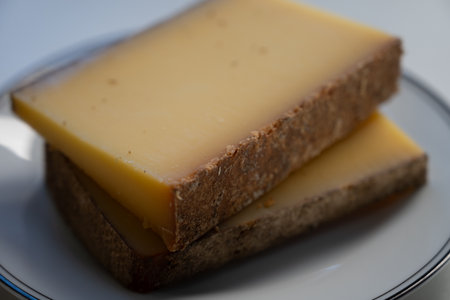 French yellow cheese Comte, varieties unpasteurized cow milk Prestige, fruity flavored and Vieille Reserve close upの写真素材
