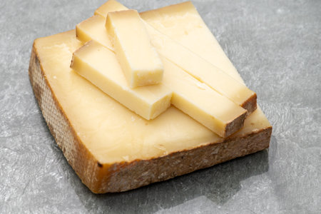 French yellow cheese Comte, varieties unpasteurized cow milk Prestige, fruity flavored and Vieille Reserve close upの写真素材