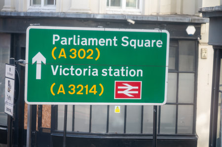 Transportation in London city, roads, road signes, street signs, different warnings, indicating of directions in Great Britain, city life in Englandの写真素材
