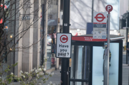 Transportation in London city, roads, road signes, street signs, different warnings, indicating of directions in Great Britain, city life in Englandの写真素材