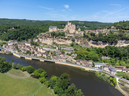 Beynac-et-Cazenac village located in Dordogne department in southwestern France with medieval Chateau de Beynac, one of most beautiful villages of France, aerial view in springの写真素材
