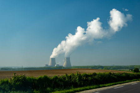 View on cooling towers of nuclear power plant thermal power station in which heat source is nuclear reactor, France, Europe, cheap energy sourceの写真素材