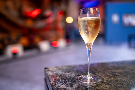 Celebration, night or beach club with party lights in France or Monaco and glass of champagne...