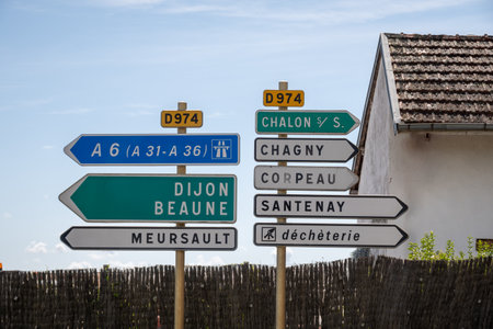 Driving in summer on road, signs direction to Dijon, Beaune and other French cities, different types...