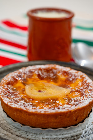 Basques bio food, sheep's milk curd dessert Mamia or Cuajada, Curd, maman, gatzatua or gaztanbera Original Basque Dessert curdled with rennet and homemade pears cakeの写真素材