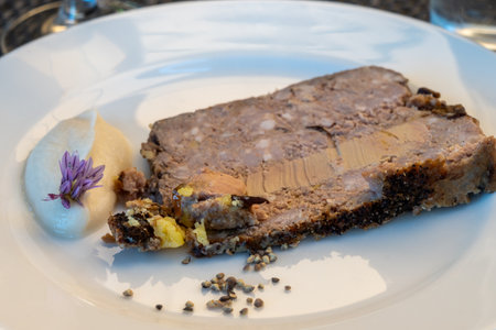 Terrine foie gras specialty food product made of liver of a duck or goose, served in French restaurant in Perigoed, Dordogne, starter dishの写真素材
