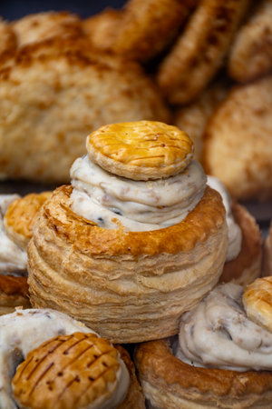 Stuffed pastry filled with meat or mushroom sauce, French cuisine vol-au-vent starter dish close up