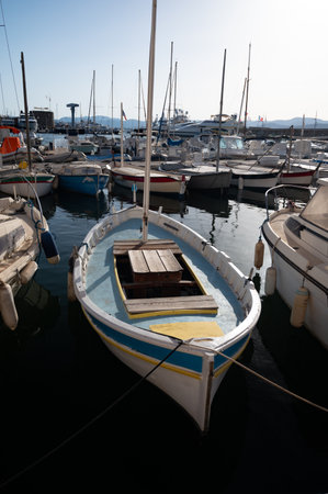 Old port of Saint-Tropez famous touristic village on French Riviera, summer vacation with large yacht boats and colorful houses, Franceの写真素材