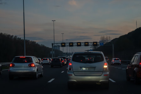 Road network infrastructure in Netherlands, driving safe on high quality asphalt on Dutch highways, traffic jam problems, road construction, many cars, rush hoursの写真素材