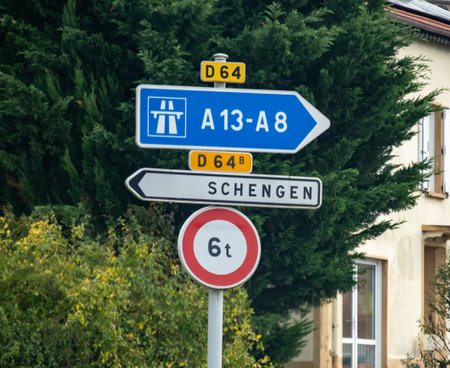 Transport infrastructure in Europe, road signs, directions, country borders, driving car on motorwayの写真素材