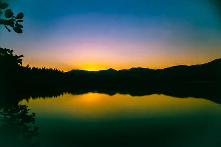 Chocorua Lake during a summer sunsetの写真素材