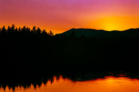 Chocorua Lake during a summer sunsetの写真素材