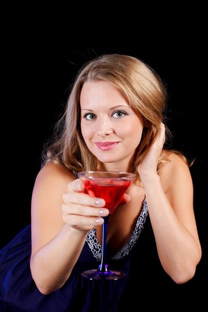 a charming young lady holding a glass of red wineの写真素材