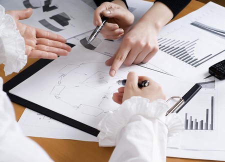 Hands of business women are actively discussing the business project. Workplace business woman. の写真素材