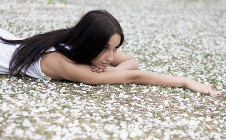 Young woman at spring parkの写真素材