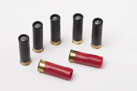 Cartridges from a hunting rifle on an isolated white background. Hunting.