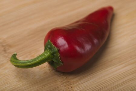 Chilli. Red pepper. Red mountain ash. Chili pepper on an isolated background. Kitchen