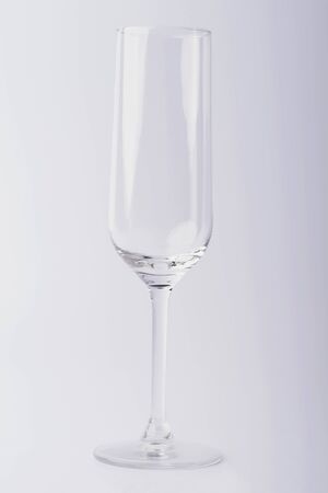 Glass on a white background. Glass on a white isolated background. Glass for alcoholic drinks.の写真素材