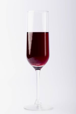 Glass on a white background. Glass on a white isolated background. Glass for alcoholic drinks.の写真素材