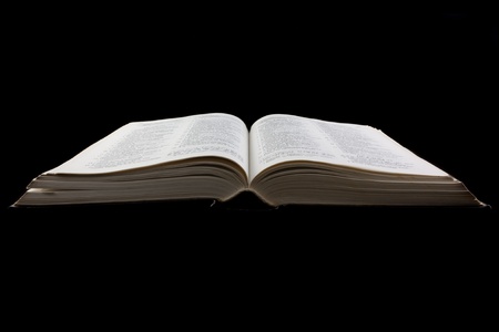 The open book on a black background.の写真素材