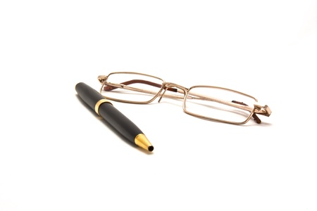 Pen and eyeglasses isolated on white.の写真素材