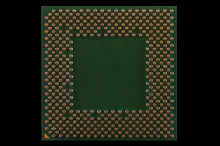 Microprocessor green isolated on a black background の写真素材