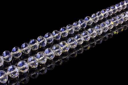  Shiny necklace isolated on a black background の写真素材