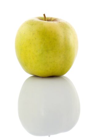 Juicy green apple isolated on a white background の写真素材