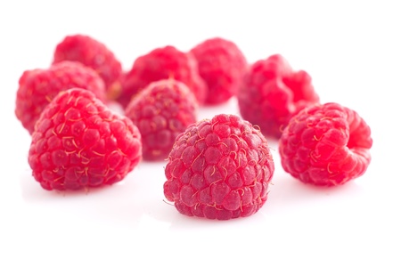 A bunch of ripe raspberries on white background  の写真素材