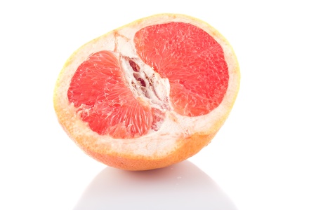 Half of fresh grapefruit on white background の写真素材
