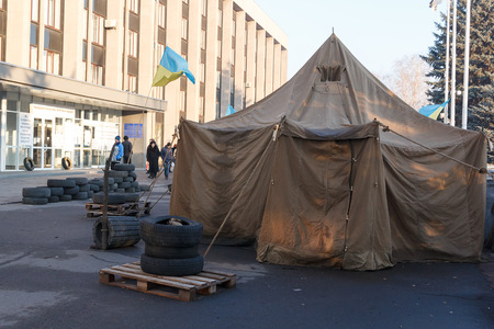 KRIVOY ROG, UKRAINE - DEC 13 - People demand the resignation of the government of Krivoy Rog, living in tents in front of the city administration, Saturday 13 December 2014のeditorial素材