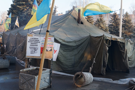 KRIVOY ROG, UKRAINE - DEC 13 - People demand the resignation of the government of Krivoy Rog, living in tents in front of the city administration, Saturday 13 December 2014のeditorial素材