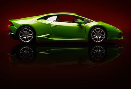 SANTAGATA BOLOGNESE, BOLOGNA, ITALY - JAN 20 - Toy lamborghini huracan on red background, Tuesday 20 January 2015のeditorial素材