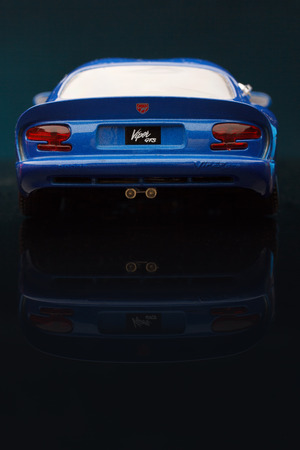 KRIVOY ROG, UKRAINE - JAN 04 - Toy blue dodge viper on black background, Saturday 4 January 2014のeditorial素材