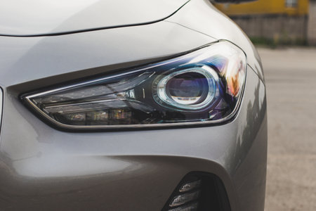 Krivoy Rog, Ukraine - May 4, 2023: Photo of gray car Genesis G70 on the street.のeditorial素材