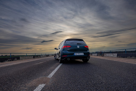 Krivoy Rog, Ukraine â March 24, 2024: Photo of green car Volkswagen Golf GTI on the street.のeditorial素材