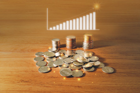 Saving concept of financial improvement progress by stack of coin or cash growing on wooden background. Rising of graph or tree on money show for treasure and wealth of growth economy.の写真素材